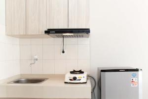 Comfortable Studio at Monroe Tower Apartment By Travelio