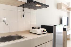 Comfortable Studio at Monroe Tower Apartment By Travelio