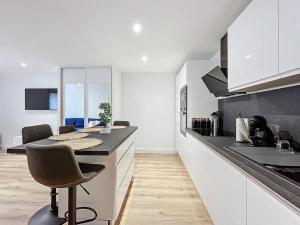 Appartements Escapade confortable et chic parking et velo-box : photos des chambres