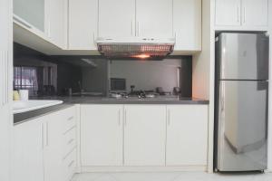 Comfy and Elegant 2BR at Sudirman Tower Condominium Apartment By Travelio