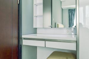 Homey and Comfy 1BR at Casa de Parco Apartment By Travelio