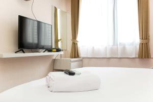 Comfort and Spacious 2BR at Meikarta Apartment By Travelio