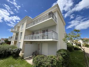 Appartements Les Dunes : photos des chambres