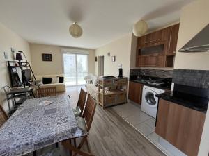 Appartements Les Dunes : photos des chambres