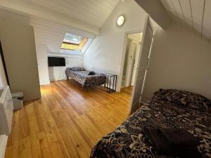 B&B / Chambres d'hotes Oliasi Poissy : photos des chambres