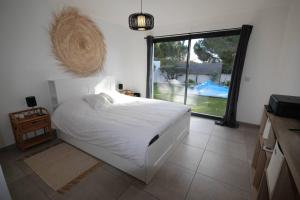 Villas Belle villa contemporaine climatisee, piscine privee, 6 - 8 couchages, 3 chambres, wifi, a 3 km de la plage -LXDALI25B : photos des chambres