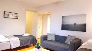 Kotimaailma Apartments - tilava saunallinen & parvekkeellinen kaksio - Verstaankatu