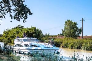 Maison T2 cabine 4 couchages, terrasse cloturée, résidence Sun village avec piscine commune, 300m de la plage à PORTIRAGNES PLAGE LRSUNR6