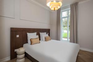 Appart'hotels L-Horloge - Appart-Hotel proche de Disneyland : photos des chambres