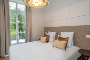 Appart'hotels L-Horloge - Appart-Hotel proche de Disneyland : photos des chambres