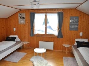 Apartment Chalet Fluegärtli by Interhome