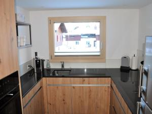 Apartment Chalet Fluegärtli by Interhome