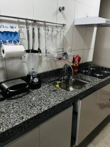Apartamento de 2 quartos Possuã, até 4 pessoas com cozinha