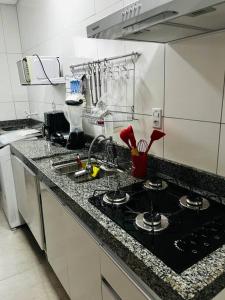 Apartamento de 2 quartos Possuã, até 4 pessoas com cozinha