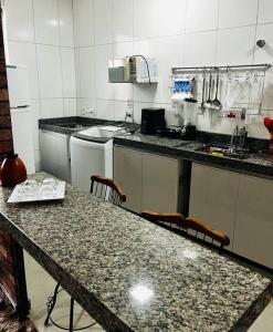 Apartamento de 2 quartos Possuã, até 4 pessoas com cozinha