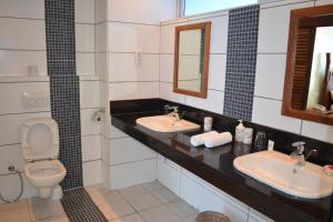 Cowrie Shell Beach Apartments Official