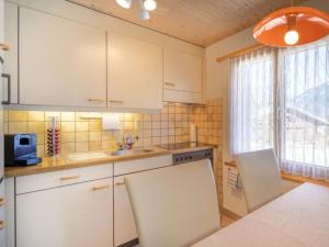 Apartment Hübeli - Moosmatten by Interhome