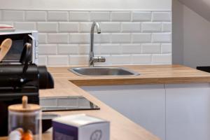 Appartements Bertille studio atypique en centre ville : photos des chambres