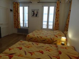 Appartements ApartHotel Francois 1er - 16eme : photos des chambres