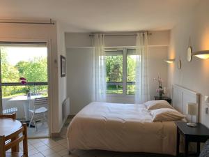 Appartements Residence Les Fontaines des Thermes de Castera-Verduzan : photos des chambres