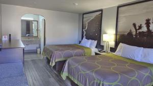 Queen Room with Two Queen Beds - Non-Smoking room in Super 8 by Wyndham Houston/Willowbrook Hwy 249