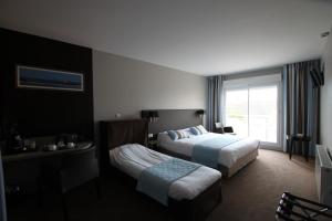 Hotels Hotel Le Cheval Blanc : photos des chambres