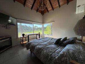 Carilo para 10, frente al golf con Pileta Climatizada!