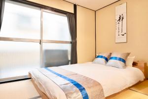 Kizuna 絆 - 5 Bedding in 2 Japanese-style Bed Rooms, 11 PAX, 30min to USJ, Kaiyukan Aquarium, Namba, Osaka Catsle, and Tsutenkaku Tower, Self-check-in Property, Quiet Neighborhood Stay, Perfect for Families & Business Guests, Extended Stay Perks