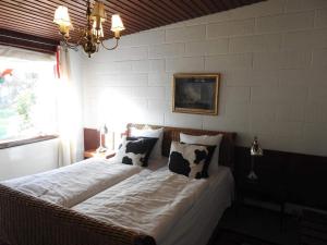 Queen suite in a hotel in Tranekær