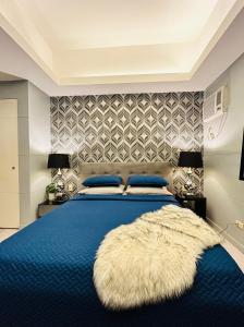 BEAUTIFUL and SPACIOUS 2 REAL BEDROOMS 2 BATHROOMS IN BGC GLOBAL CITY