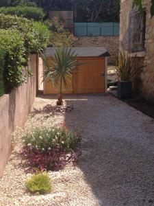 Appartements Les Lones avec jardin : photos des chambres