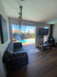 Casa Buda com piscina e espaço gourmet