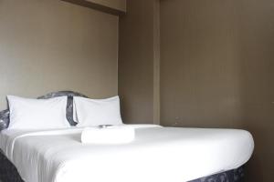 Minimalist Studio Room at Gateway Ahmad Yani Cicadas Apartment By Travelio