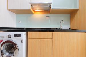 Homey and Comfy Studio Room at Menteng Park Apartment By Travelio