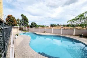 RedDoorz Premium Near Imperium Superblok