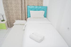 Simply 1BR at Casa De Parco Apartment By Travelio