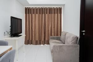 Simply 1BR at Casa De Parco Apartment By Travelio