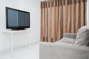 Simply 1BR at Casa De Parco Apartment By Travelio