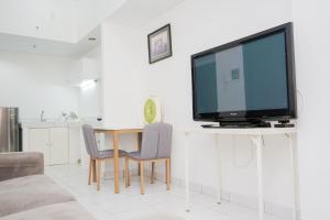 Simply 1BR at Casa De Parco Apartment By Travelio