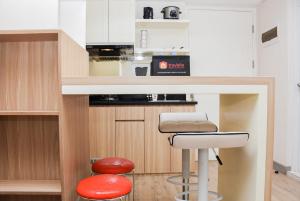 Comfort and Homey 2BR at Springlake Apartment Bekasi By Travelio