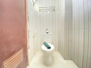 Simply 3BR Apartment at Gateway Ahmad Yani Cicadas By Travelio