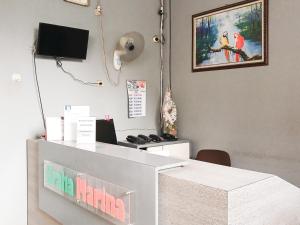 Graha Marina RedPartner near Plaza Marina