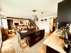 Appartements Fermette cosy, Bain nordique & Baby foot : photos des chambres