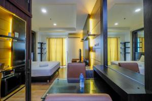 Fancy and Classic Studio Room at Bellezza Apartment By Travelio