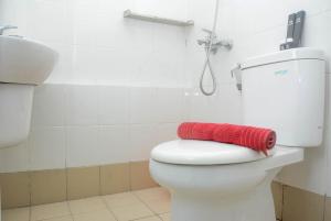 Cozy Stay 2BR Bassura City Apartment near Mall By Travelio