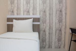 Cozy Stay 2BR Bassura City Apartment near Mall By Travelio