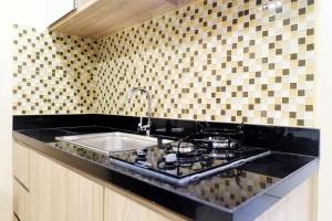 Comfy Studio Apartment at Anderson Tower Supermall Mansion By Travelio