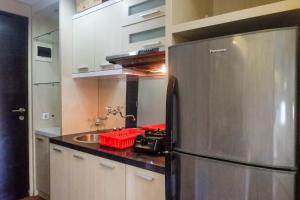 Trendy and Tidy Studio Room at Puri Mas Apartment By Travelio