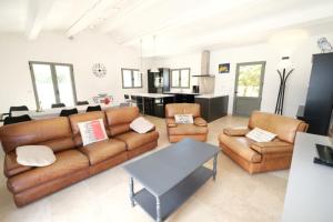 charming vacation rental with heated pool at the foot of the alpilles, in aureille, close to the center of the village on foot, sleeps 68 people in provence.