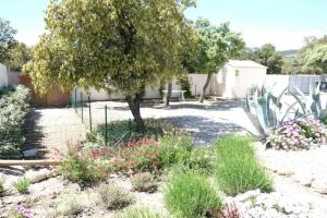 charming vacation rental with heated pool at the foot of the alpilles, in aureille, close to the center of the village on foot, sleeps 68 people in provence.